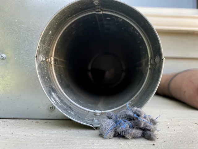 Rincon Dryer Vent Cleaning technician using specialized equipment to clear severe dryer vent blockage in Rincon